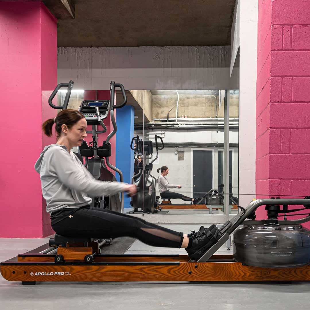 A woman exercising in the gym at Framework.